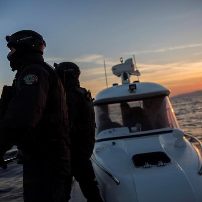 Dozens of migrants rescued off Greek island of Lesbos. Search is under way for woman feared missing